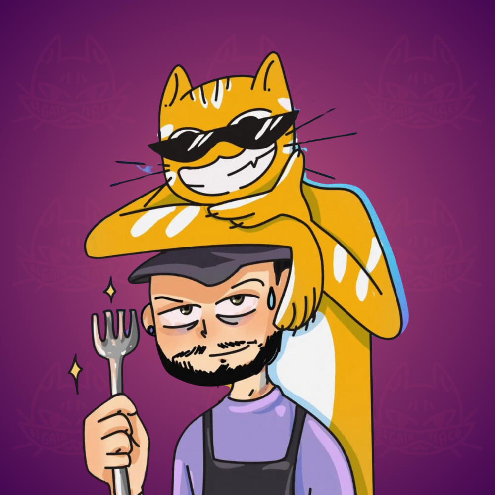 Jorge, el cocinero, con una paleta de cocina y el gato posado en su cabeza